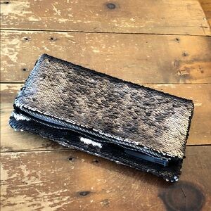 Stella and Dot metallic sequined clutch.